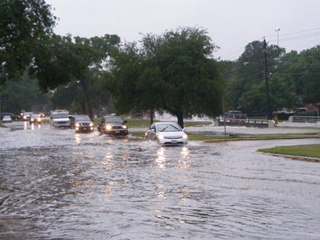 Illustration for article titled Turn Around Don't Drown: Houston Street Flooding Mega-Gallery
